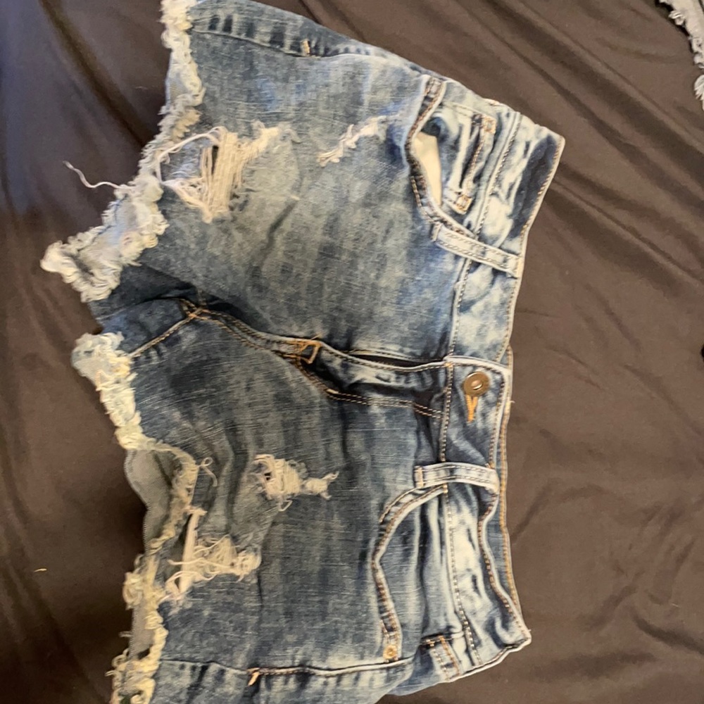 Arizona Jeans size 1. They are naturally ripped and they are hardly used.